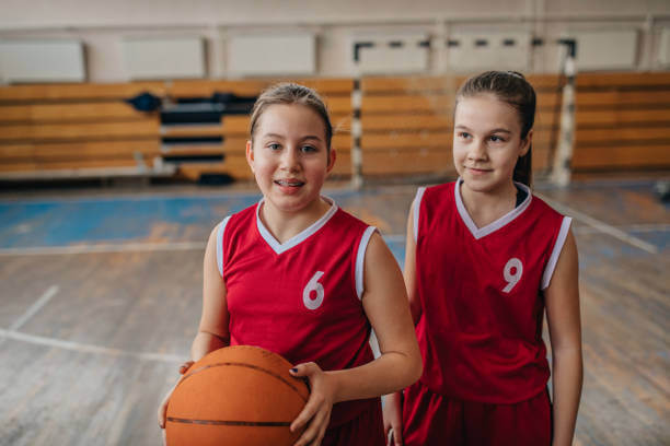 Basketball players on basketball court